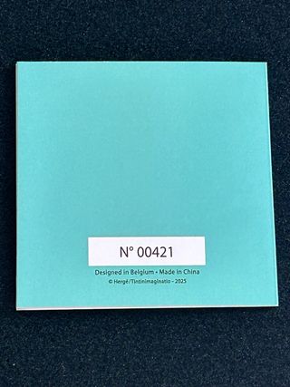 Figura de Tintín y Milú en el Lejano Oriente