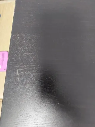 Mesa extensible Ikea negra.