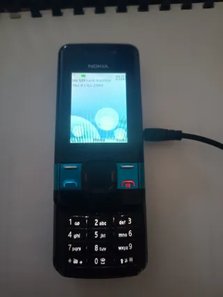 Nokia 7100 con cargador