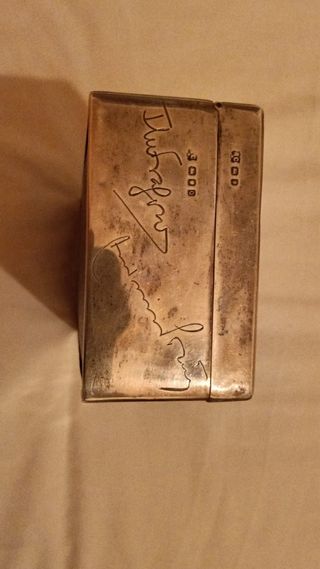 Pieza Coleccion con inscripciones y sellos.