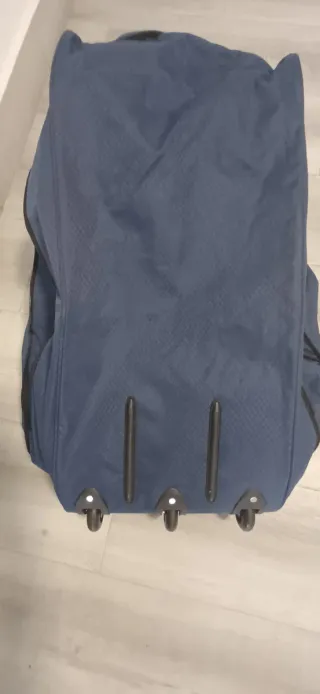 Bolsa de lona expandible con ruedas.No se envia.