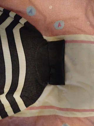 Jersey cuello alto rayas gris y blanco