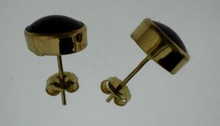 PENDIENTES DE ORO 18 QUILATES Y RUBÍ ESTRELLA