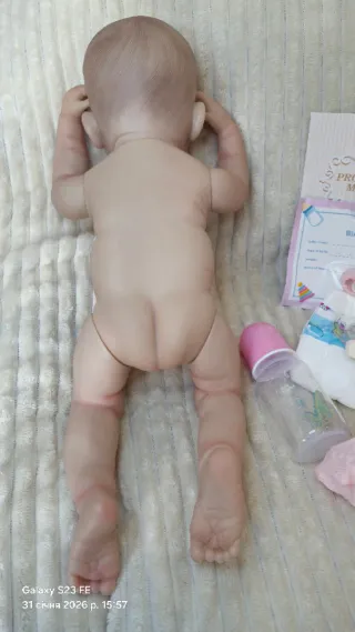 Bambola stile reborn 48cm, corpo in vinile