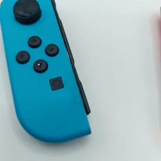 Nintendo Switch OLED + Dock + Joy‑Con Grip + Cavi