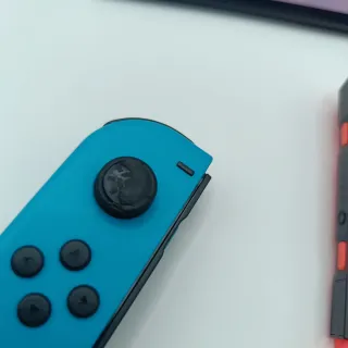 Nintendo Switch OLED + Dock + Joy‑Con Grip + Cavi