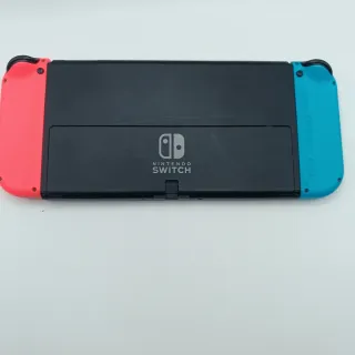 Nintendo Switch OLED + Dock + Joy‑Con Grip + Cavi