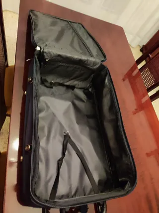 Maleta de viaje con ruedas beige y azul