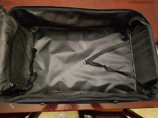 Maleta de viaje con ruedas beige y azul