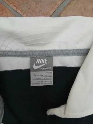 Polo Nike a righe bianche e blu