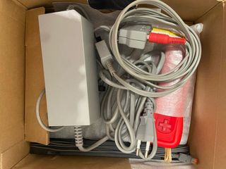 Nintendo Wii Mini Roja + Juego Mario Bros Wii