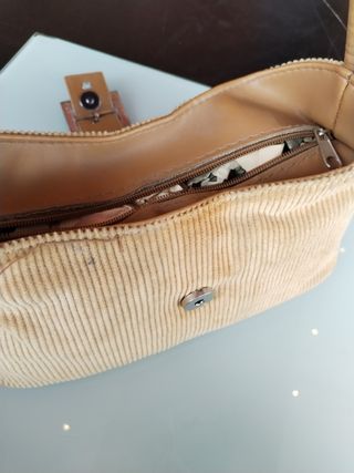 Bolsos de mano negro y azul