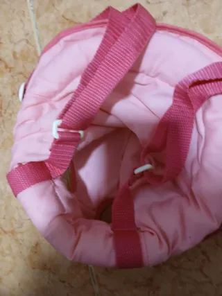 Mochila portamuñecos rosa y blanco