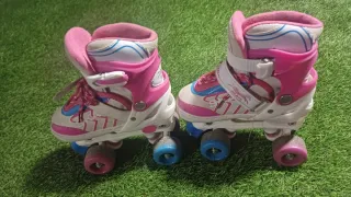 Patines rosas y blancos para niña