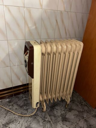 Radiador eléctrico beige y marrón