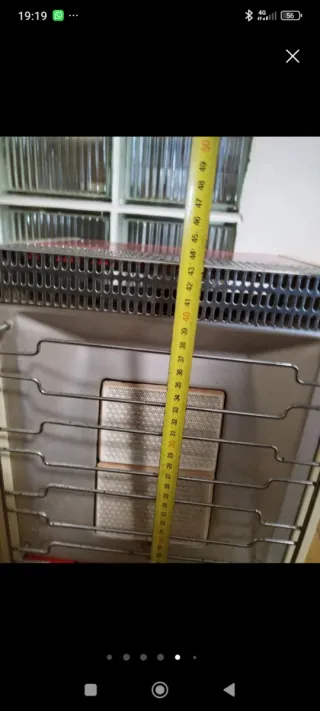 Estufa a gas roja y beige