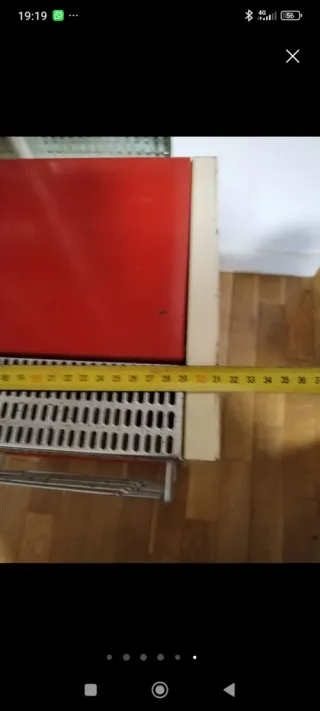 Estufa a gas roja y beige