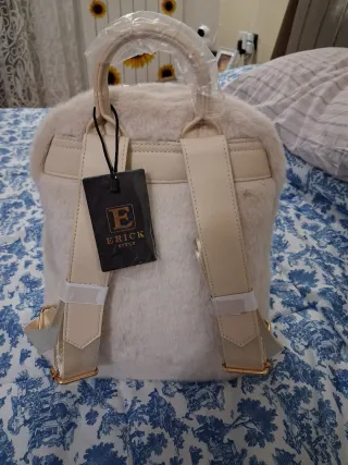 Zaino beige in pelliccia sintetica