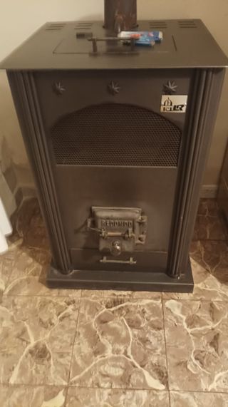 Estufa de orujo metálica