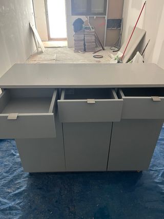 Muebles bajos de cocina piedra y madera