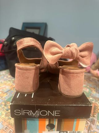 Zapatos destalonados rosa con lazo