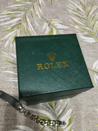 Caja y pulsera, Rolex.