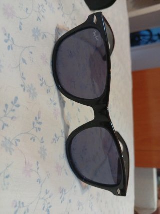 Gafas de sol Ray-Ban negras y marrones