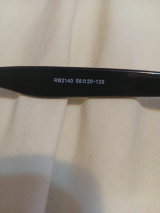 Gafas de sol Ray-Ban negras y marrones