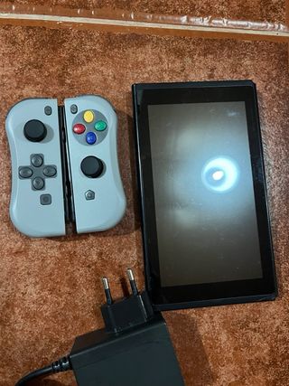 Nintendo Switch + Joy-Cons Retro + Cargador