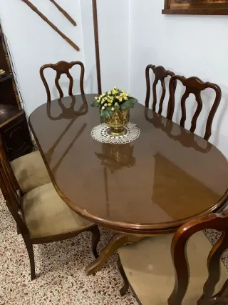 Mesa de comedor ovalada con 6 sillas