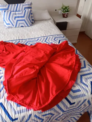 Traje de flamenca rojo volantes