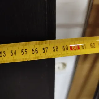 Puerta de hierro forjado con marco