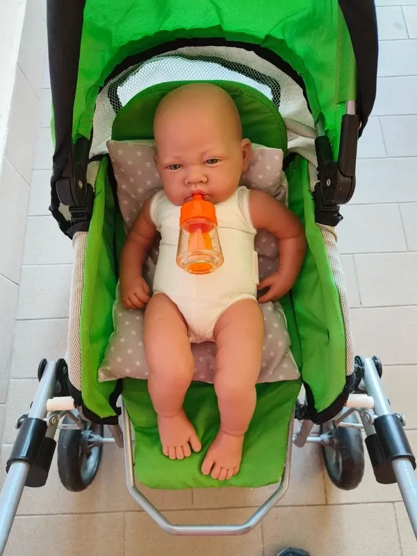 Bambolotto Reborn con Passeggino Verde