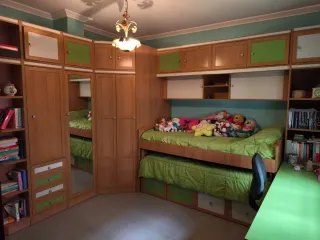 Dormitorio completo con cama nido