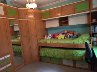 Dormitorio completo con cama nido