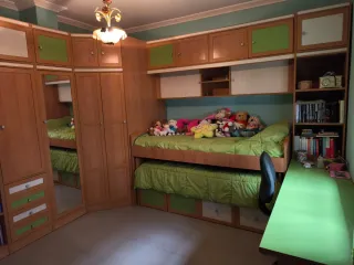 Dormitorio completo con cama nido