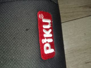 Silla de coche Piku rosa y negra