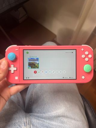 Nintendo Switch Lite Corallo completa