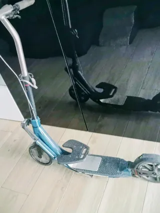 Patinete adulto con plataforma infantil