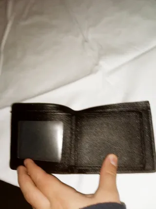 Portafoglio Gucci Nero con Logo Dorato