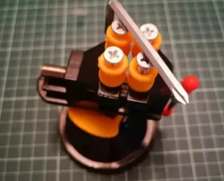 Mordaza para limpieza de monedas