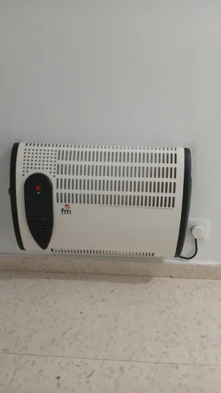 Radiador eléctrico FM blanco y negro