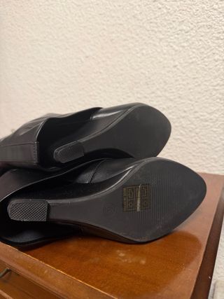 Botas altas negras con hebilla