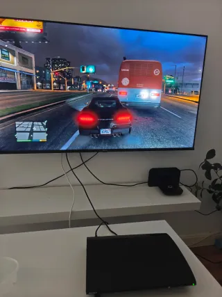 PS3 Super Slim 500GB + Caja + 2 mandos+ 4 Juegos