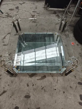 Mesa de centro cristal y metal dorado