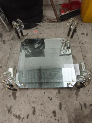 Mesa de centro cristal y metal dorado