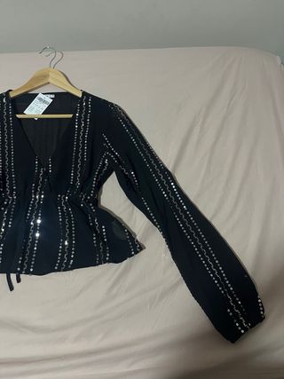 Blusa Subdued con detalles plateados