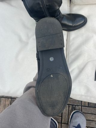 Botas altas negras con hebillas