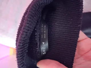 Jersey corto cuello alto negro