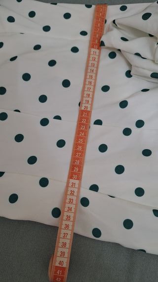 Traje de flamenca blanco con lunares